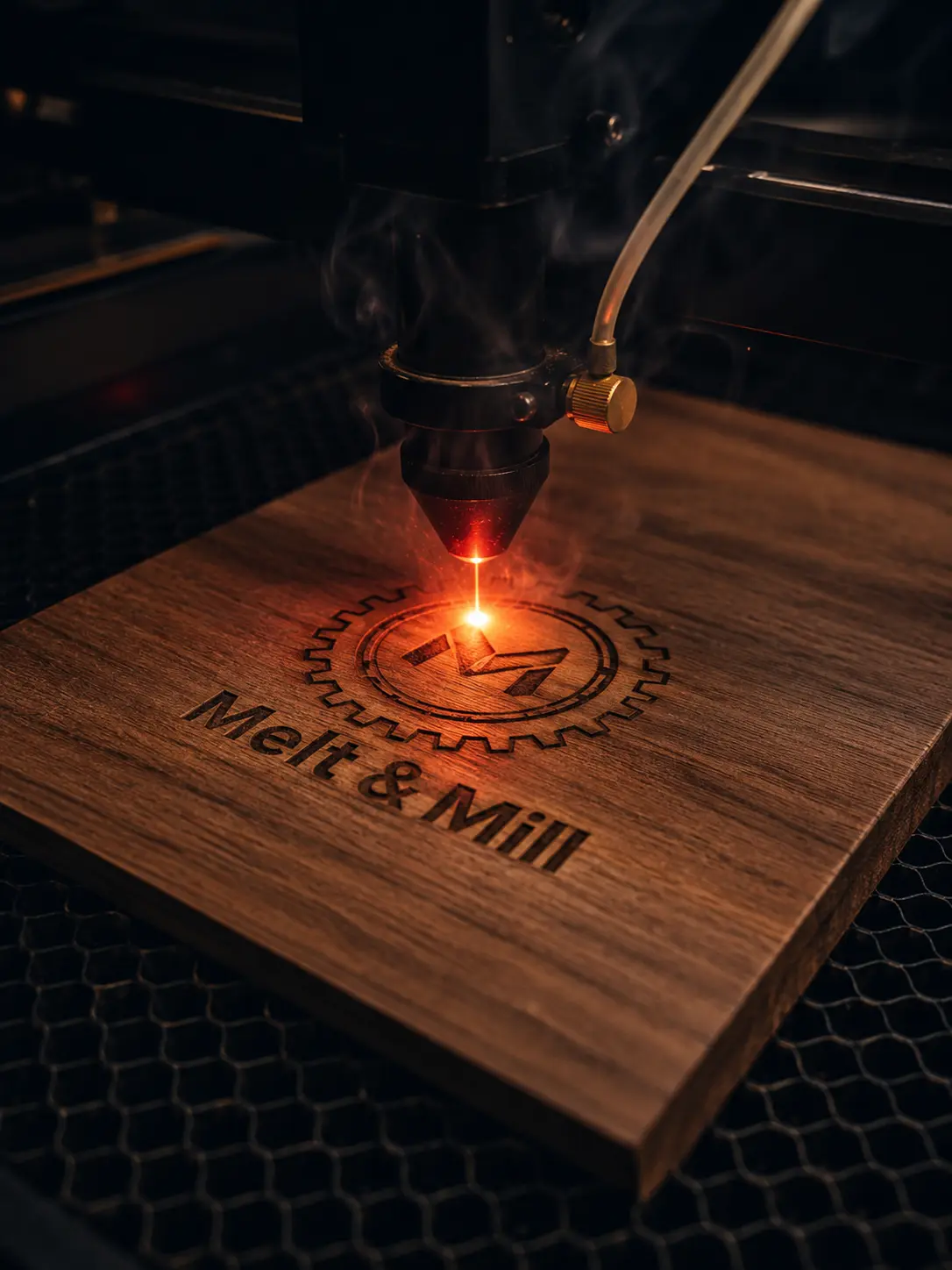 A laser cutter engraving material